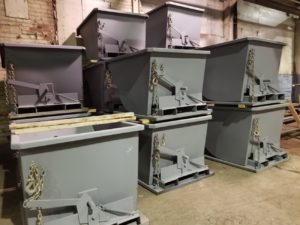 inventory of new primed self dump hoppers ready for paint